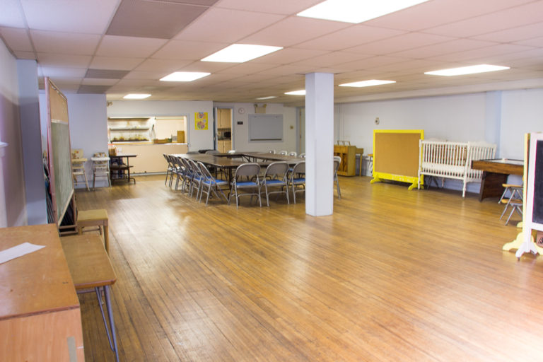 The community room’s 1,160 square feet can accommodate many activities. The hall is adjacent to a modern kitchen.